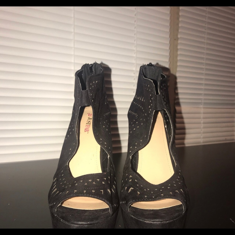 Black heels with shapes cut outs